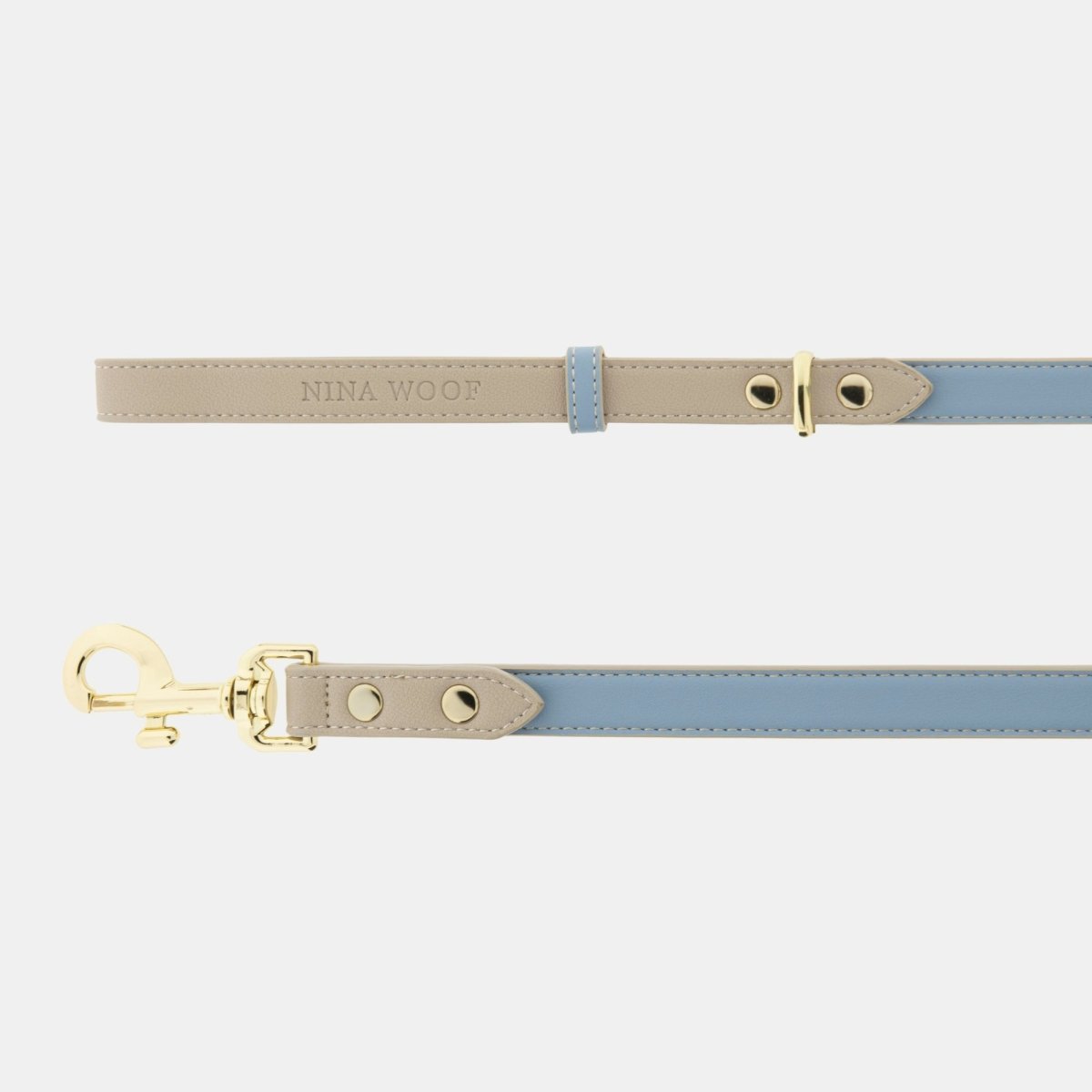Beige and light blue vegan leather dog leash with metal eyelets and gold clasp
