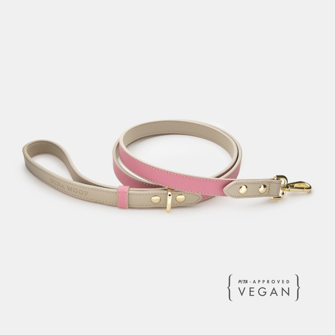 Pink and beige vegan leather dog leash with gold clip and adjustable buckle