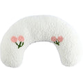 White U-shaped neck protector pillow with pink floral embroidery on both sides
