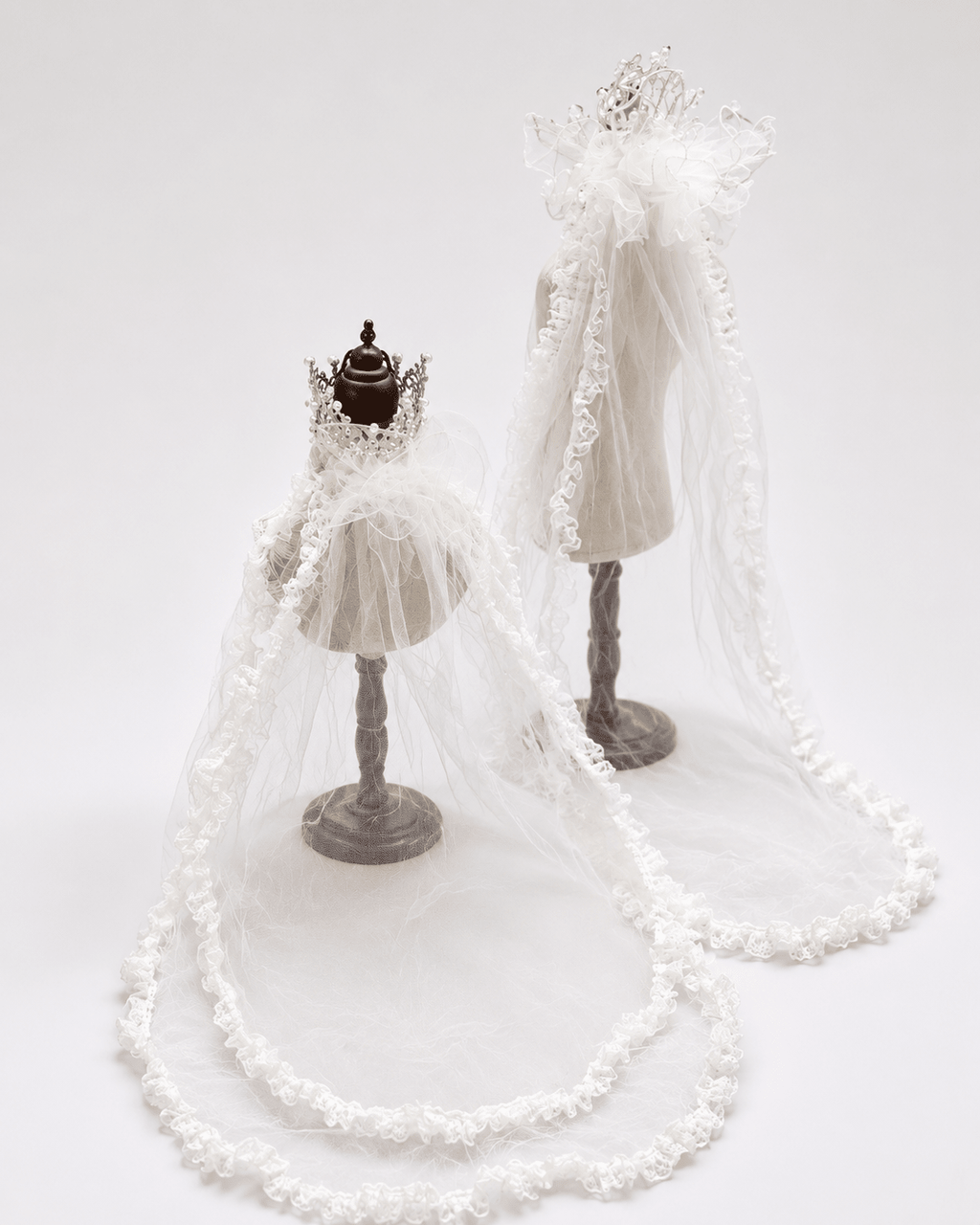 White pet bridal veil set with tiara-style pearl crown and flowing sheer veil