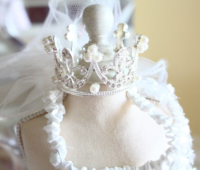 Pet tiara crown with pearl accents on a white lace-and-tulle bridal veil