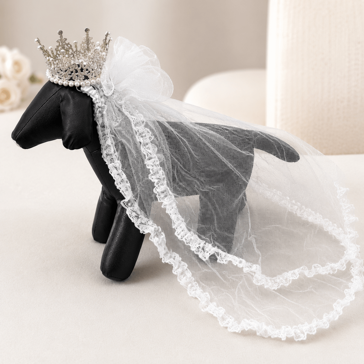 White sheer pet veil with ruffled lace trim and silver pearl crown tiara