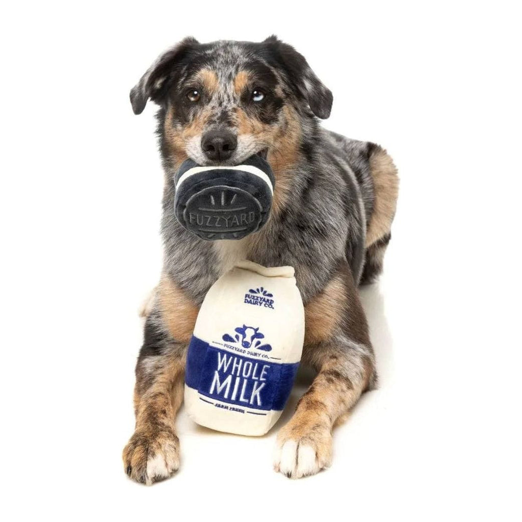 Plush whole milk bottle and dark cookie toy with blue-gray and tan dog
