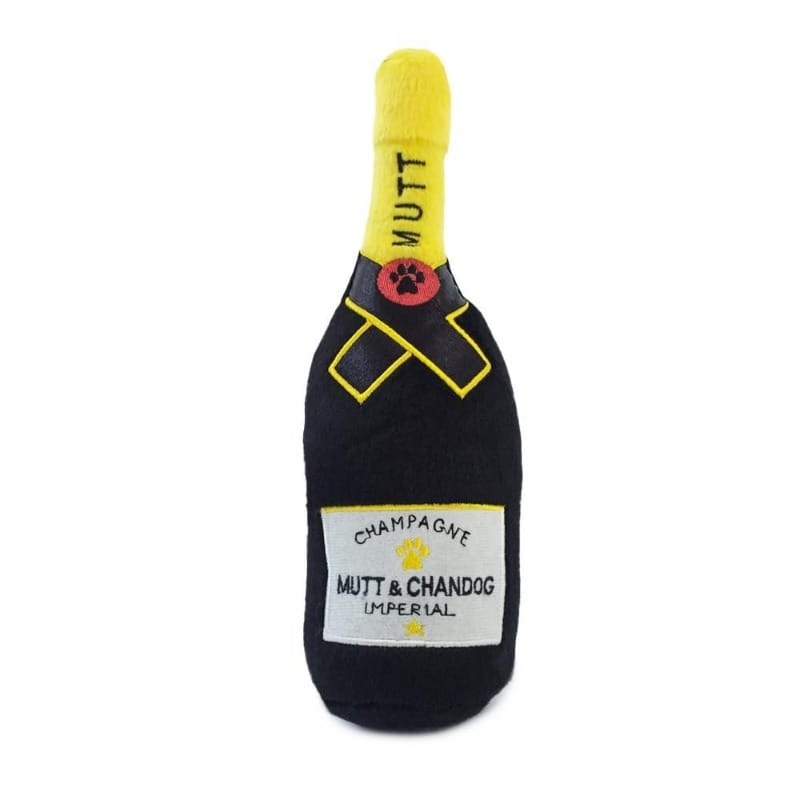 Plush squeaky dog toy bottle, dark blue with yellow cap and MUTT & CHANDOG label.