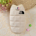 Cream fleece-lined pet dog puffer jacket with THE DOG FACE patch and neck strap