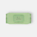 Front view of green Nina Woof biodegradable pet grooming wipes pack