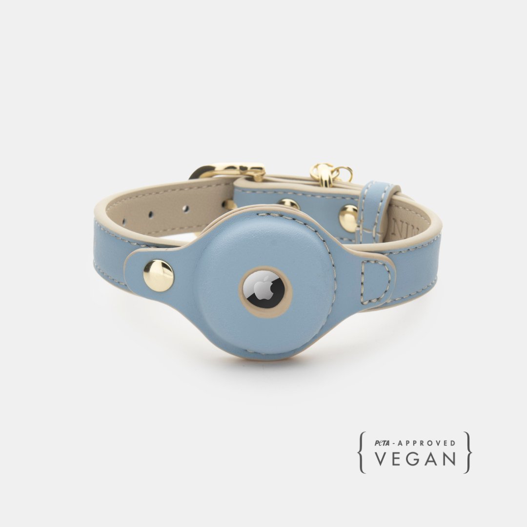 Light blue vegan leather AirTag dog collar with round AirTag holder and gold buckle