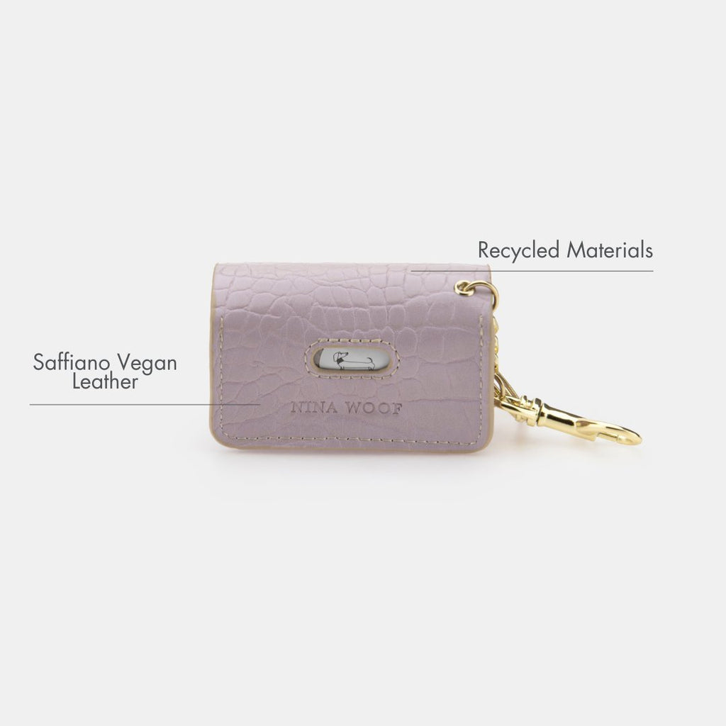 Lilac vegan leather dog waste pouch with Saffiano texture, snap flap, and gold clip