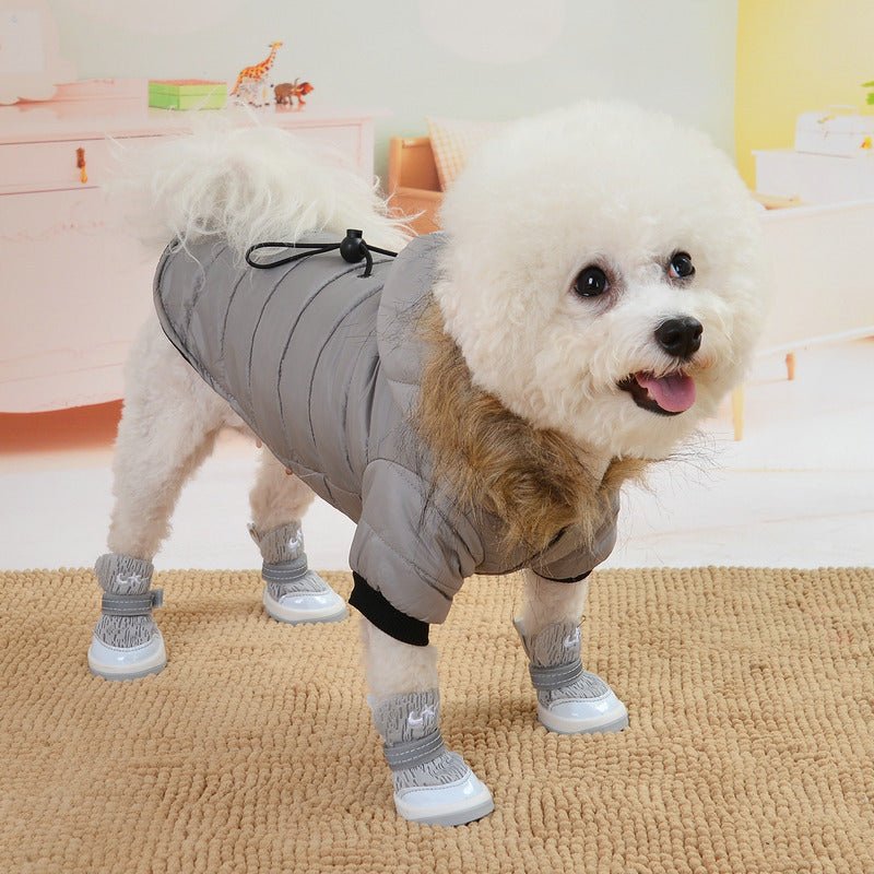 Light gray puffer winter jacket with black drawstring toggle and soft hood trim