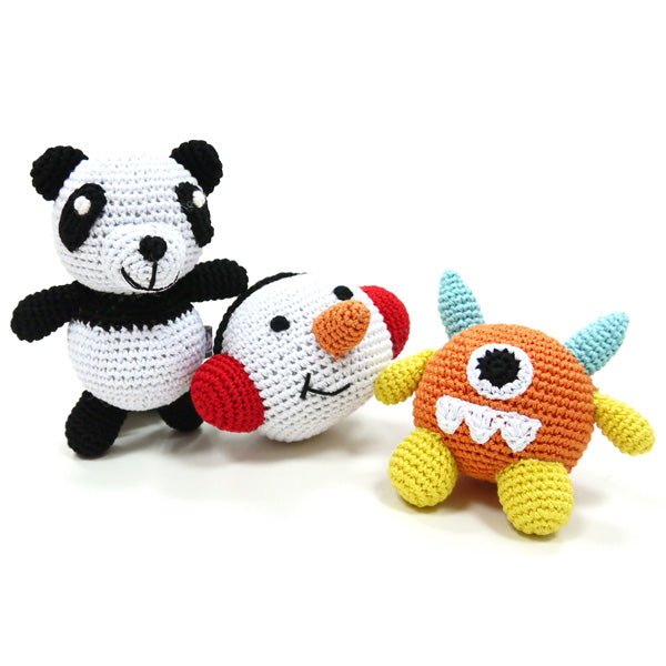 Crochet panda toy with colorful crochet companions, black-and-white face and red nose details.