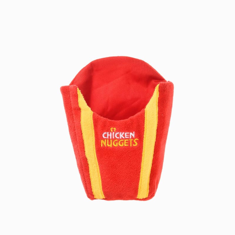 Chicken nugget plush dog toy with red shell and yellow striped sides, chicken nuggets text