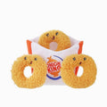 Orange and white Onion King plush cup with three tan ring plush toys