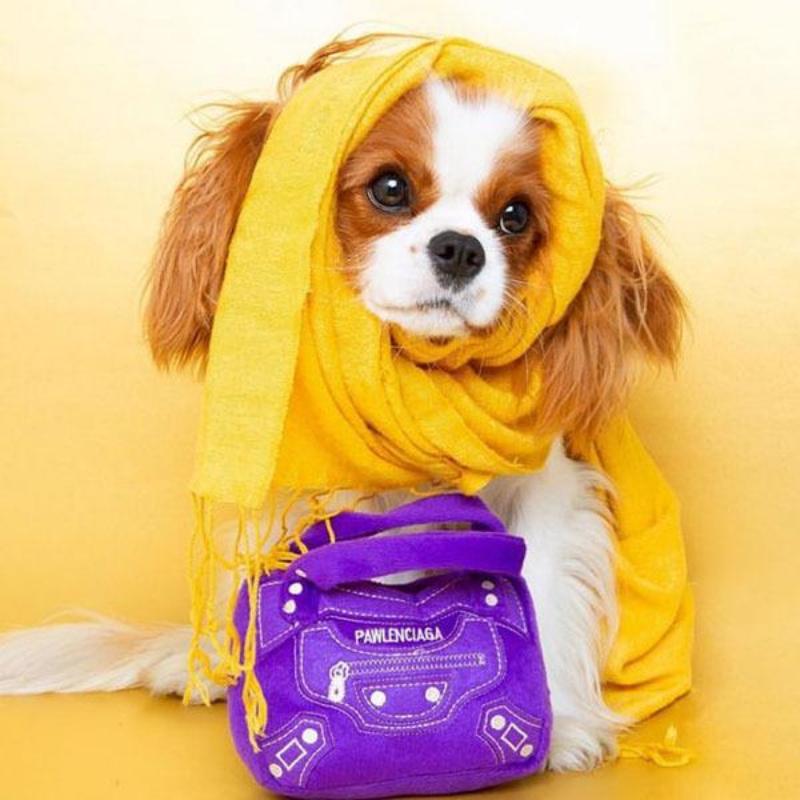 Purple plush bag dog toy, small hand-held style with Pawlenciaga logo on front