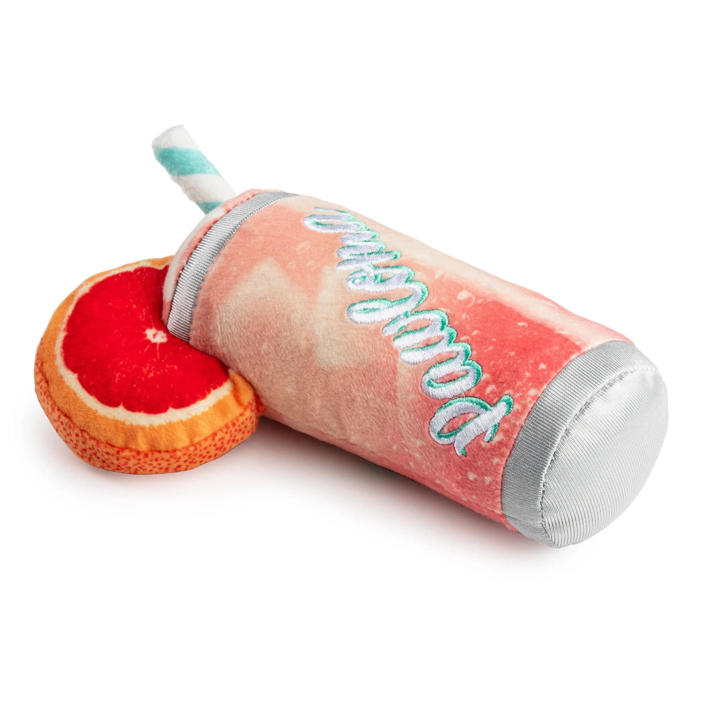 Plush tequila drink toy with straw, orange-red slice accessory, teal text on side