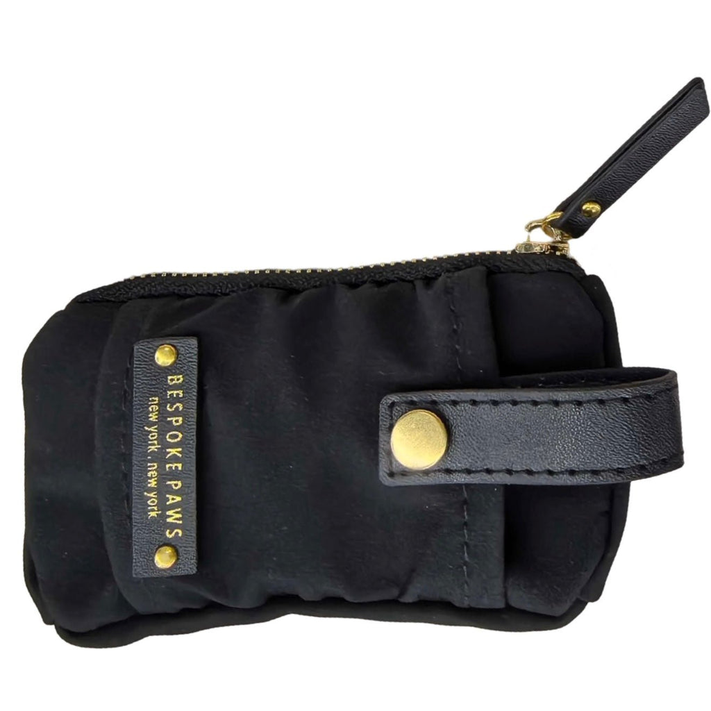 Black waste bag dispenser pouch with front pocket, snap button, and side label