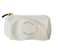 Ivory waste bag dispenser pouch with gold zipper, front logo patch, and loop strap