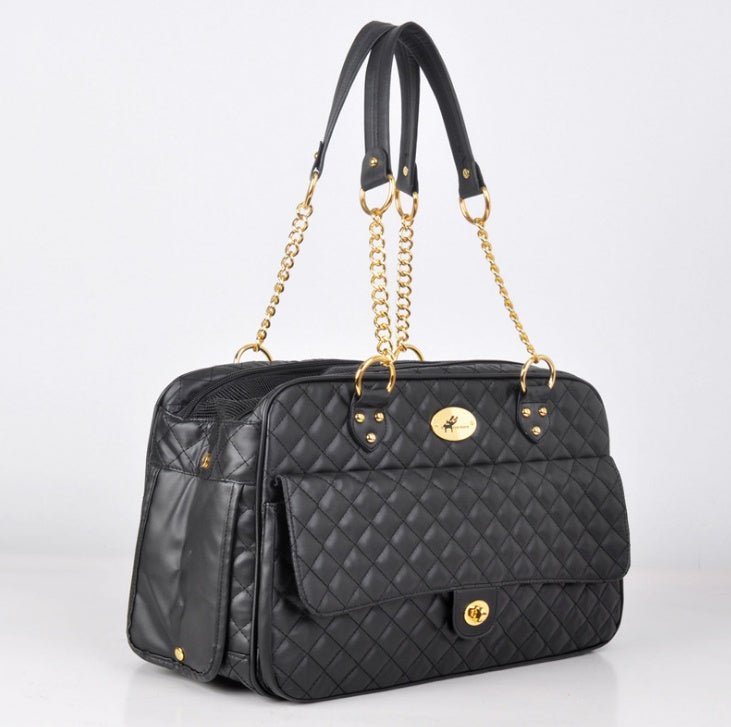 Black quilted pet carrier tote with side zipper pocket and gold chain handles