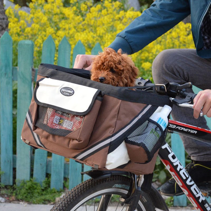 Brown front bicycle pet carrier bag with white flap and mesh window basket