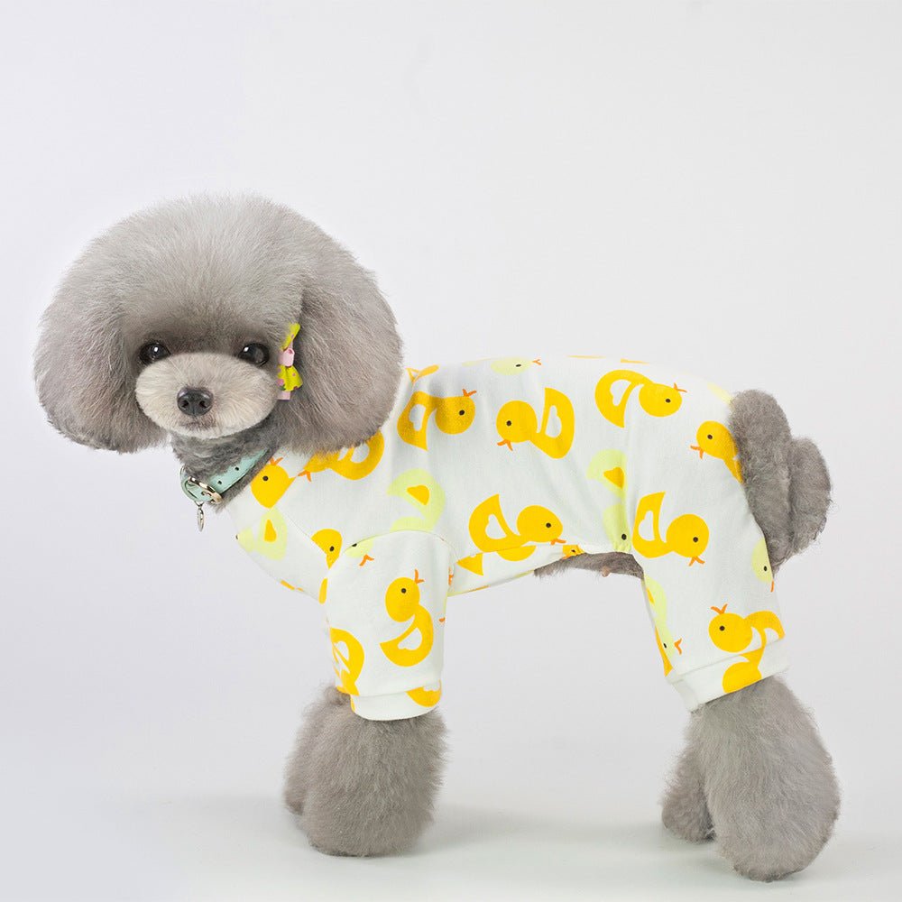 Pet pajama set in white with repeating yellow duck print and elastic cuffs