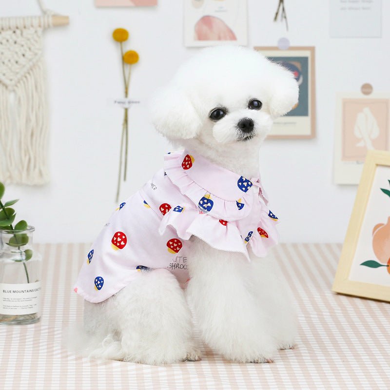 Light pink ruffled pet shirt with colorful icon print, short sleeves