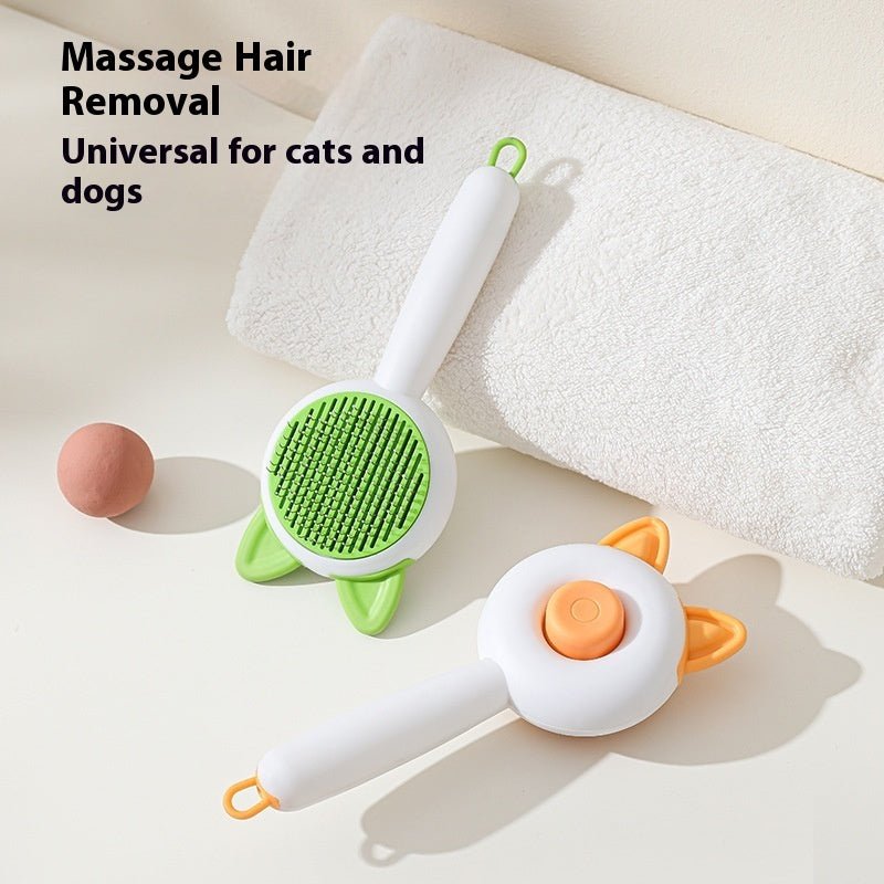 Self-cleaning pet hair grooming brush with green bristle pad and white handle, orange accents
