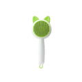 Self-cleaning pet hair grooming brush, green bristle pad with cat ears and white handle