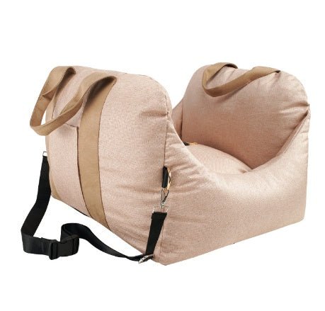 Beige dog car carrier seat with black shoulder strap and front opening