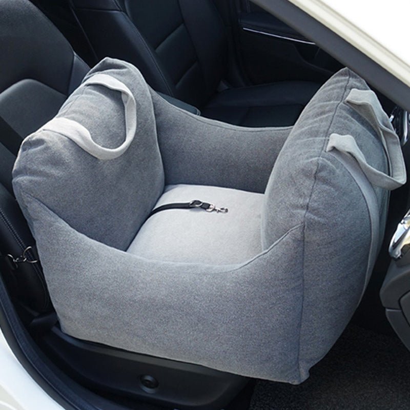 Light grey pet car carrier seat basket in car with padded walls and tether