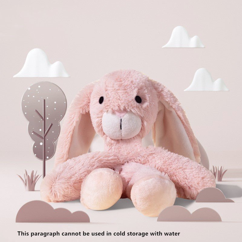 Pink bunny plush dog toy with floppy ears and soft face