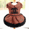 Pet dress in red tweed with black faux-fur hem, puff sleeves, and sequin trim