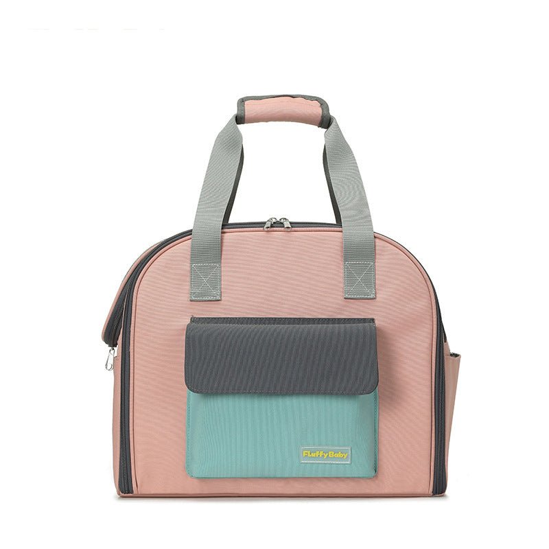 Pink pet travel backpack with teal bottom panel and dark front flap pocket