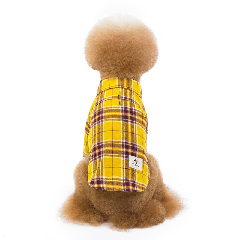 Yellow plaid pet shirt on dog with button front and chest patch label