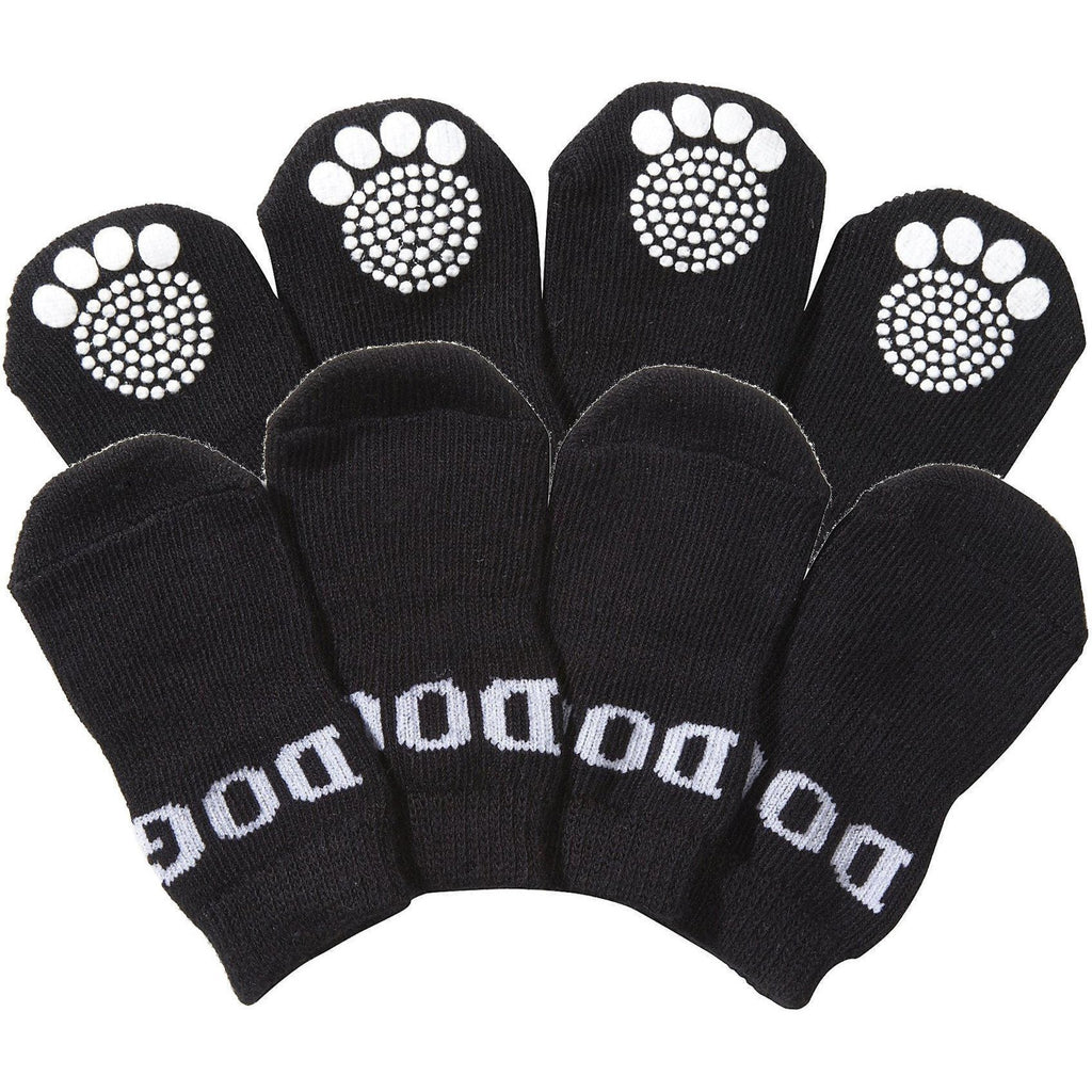Set of black pet dog socks with white paw-print grippers on the toes