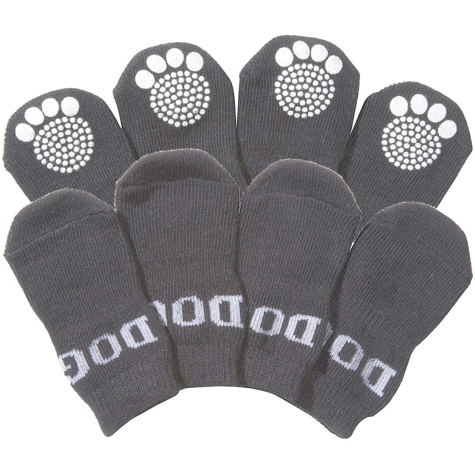 Set of dark gray pet dog socks with white paw-print grippers on the toes