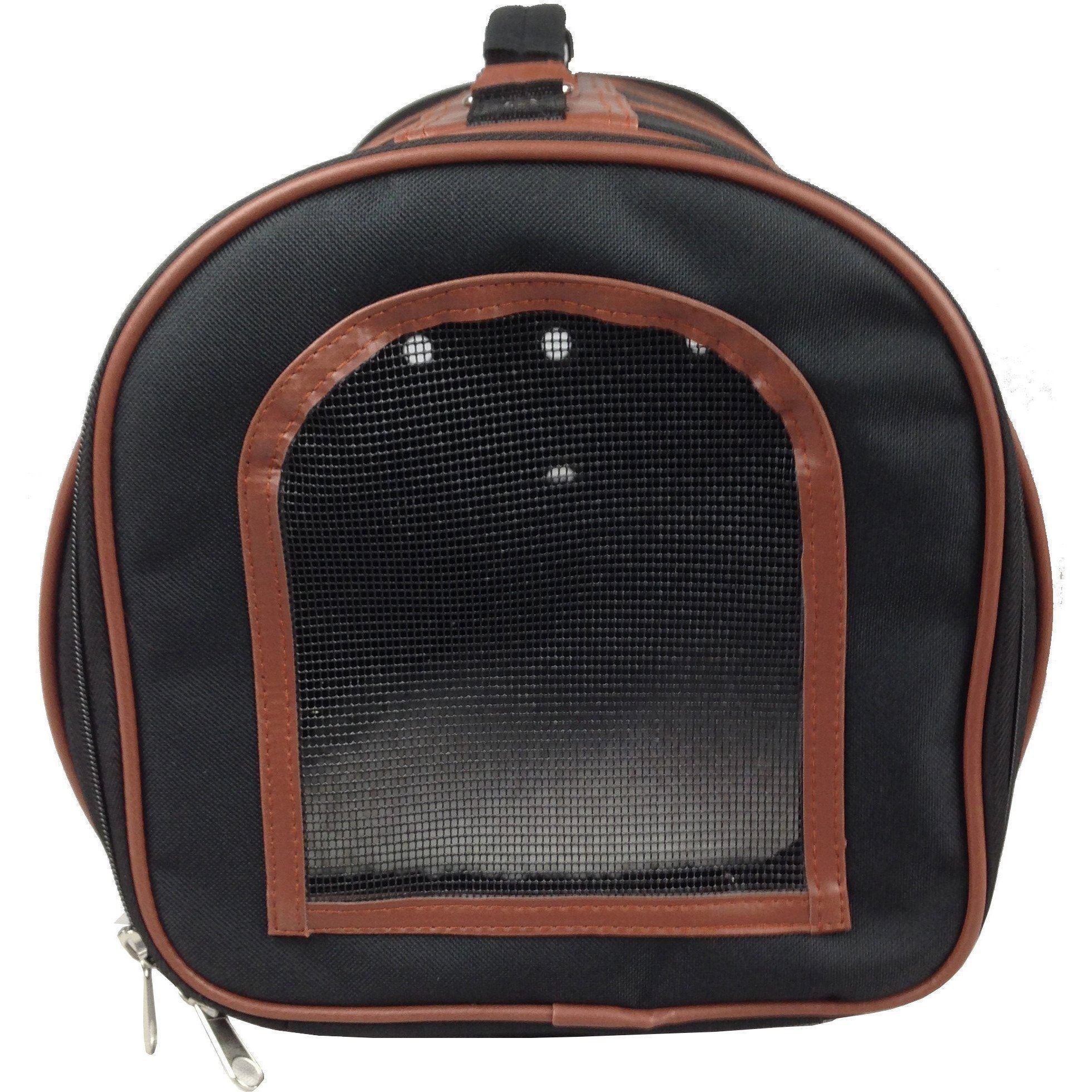Cylindrical pet carrier with mesh window door and brown leather-look frame, front view