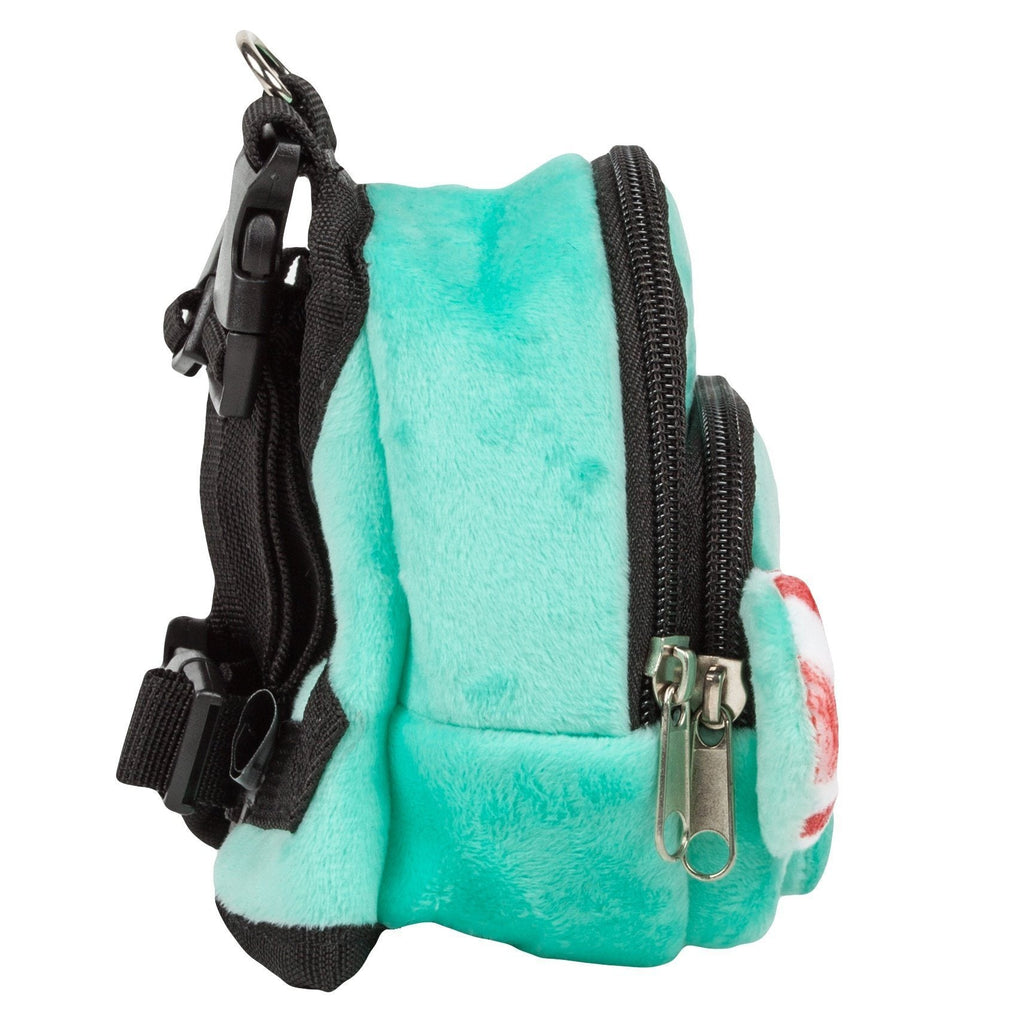 Teal plush dog backpack with black harness straps and front zipper pocket
