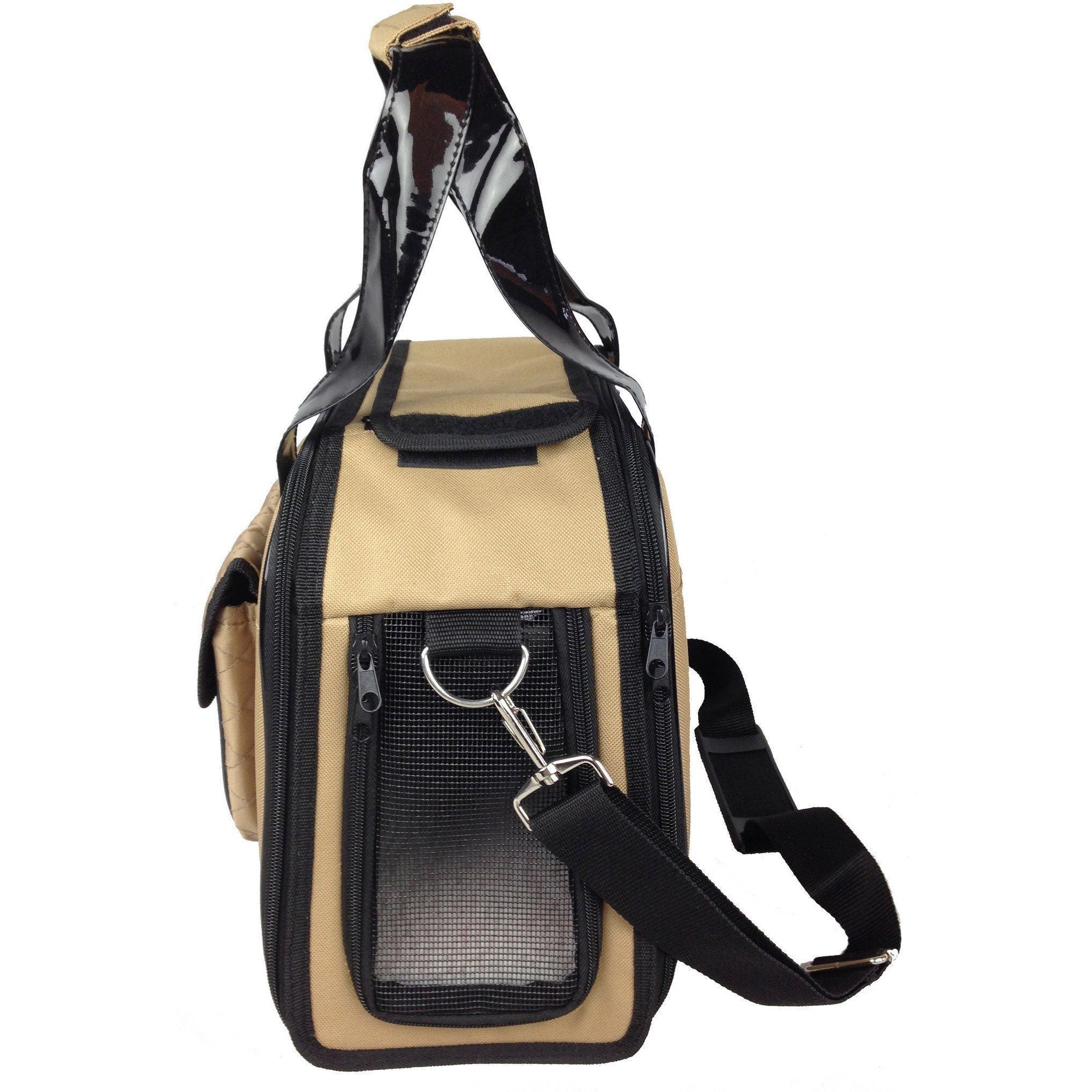 Khaki dog carrier with black trim, front mesh pouch, side zip panel, and shoulder strap