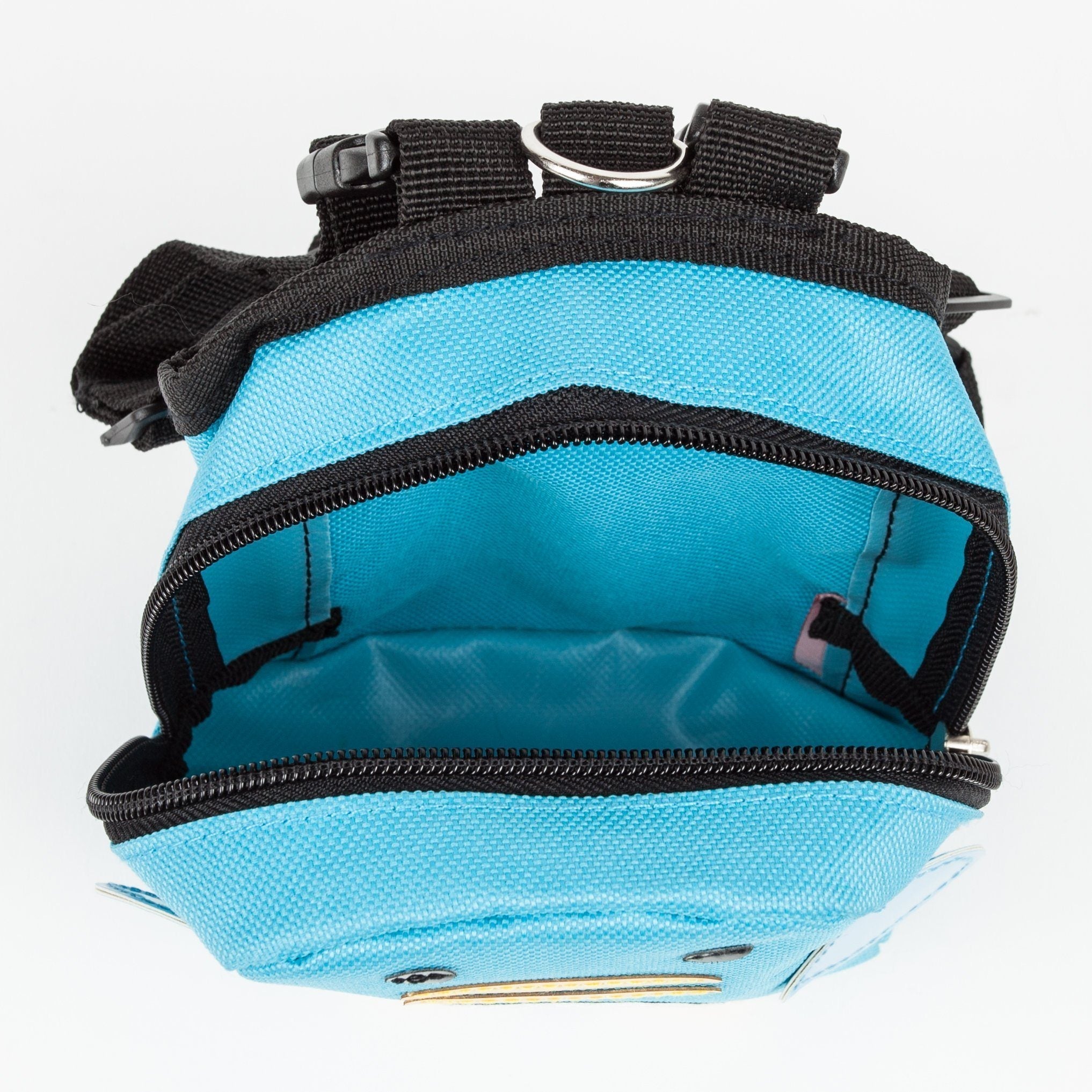 Blue dog harness backpack interior view with zip closure and black trim