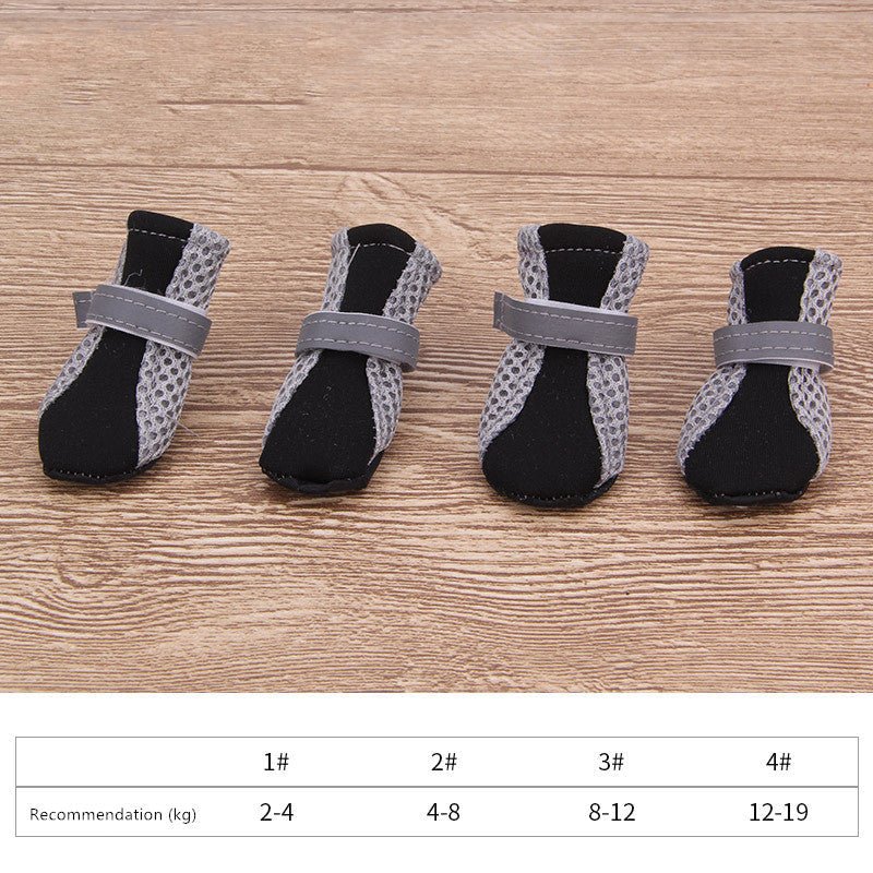 Gray-and-black dog soft pet shoes with textured fabric uppers and adjustable straps.