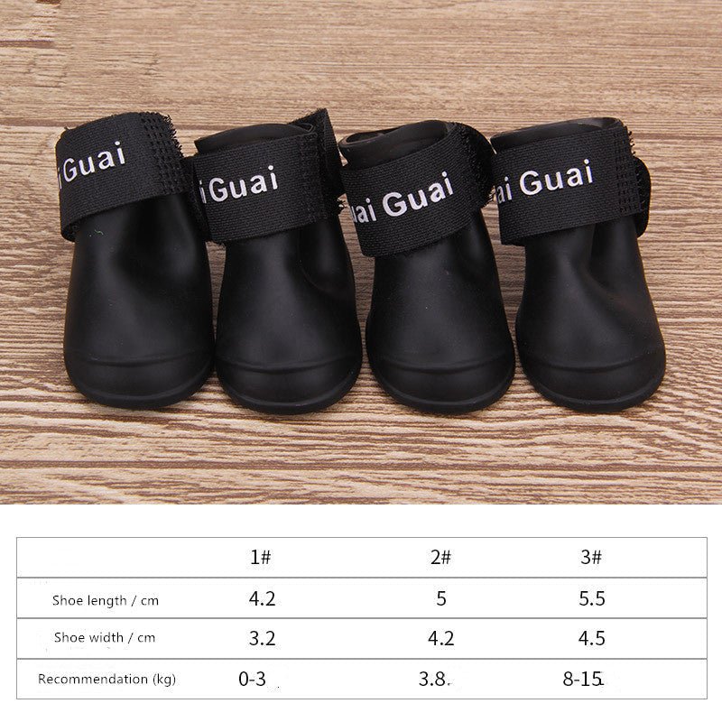 Black dog soft-soled pet shoes with wide hook-and-loop straps and rounded toe.