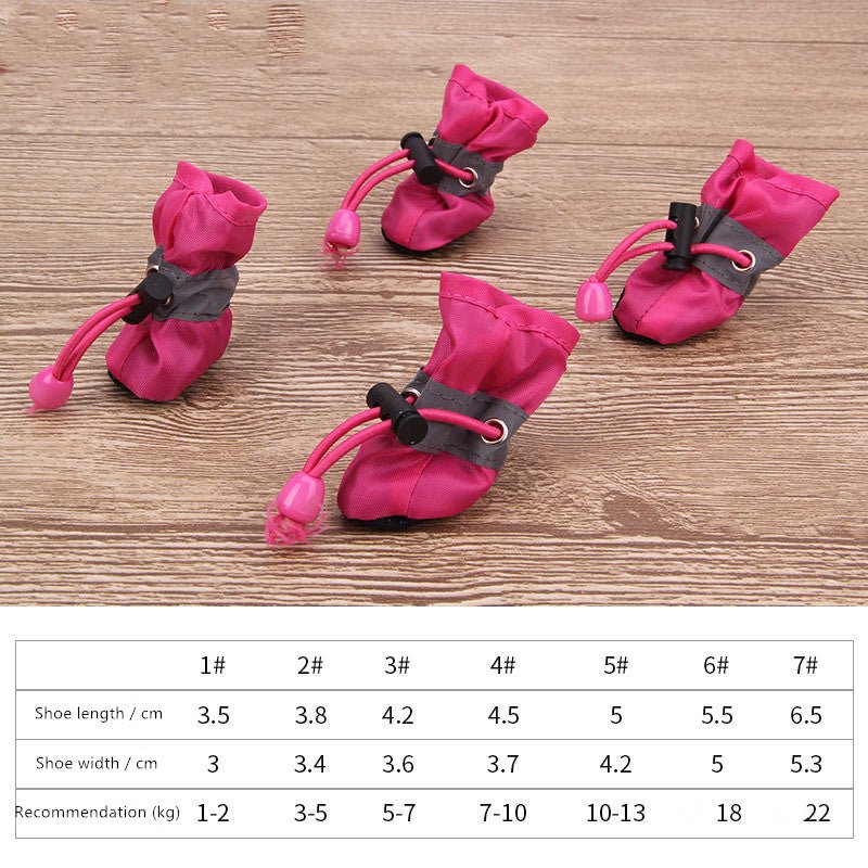 Hot pink dog soft pet shoes with faux-fur lining, black clips, and pink drawstrings.