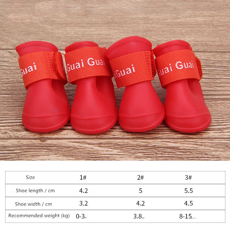 Red dog soft-soled pet shoes with adjustable hook-and-loop straps and smooth slip-on body.