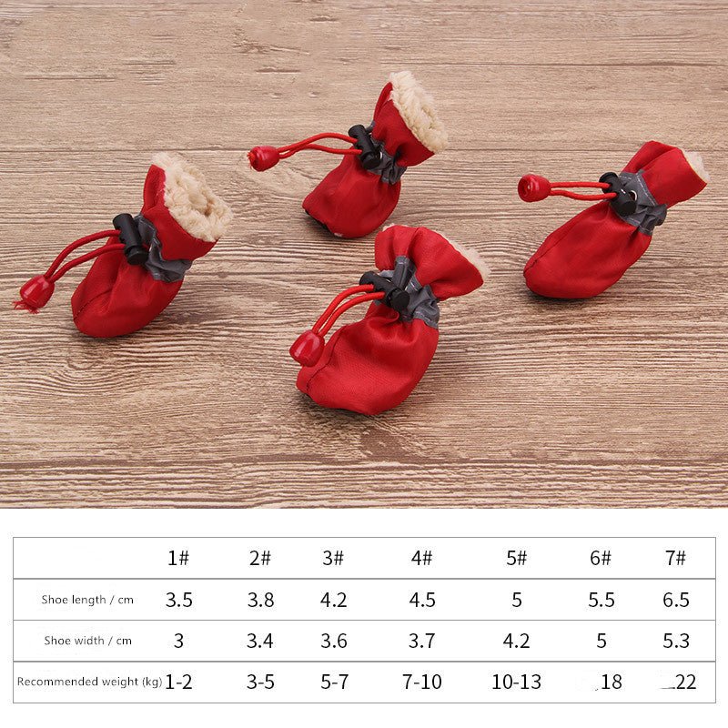 Red dog rain-style pet shoes with faux-fur lining and drawstring toggle closures.