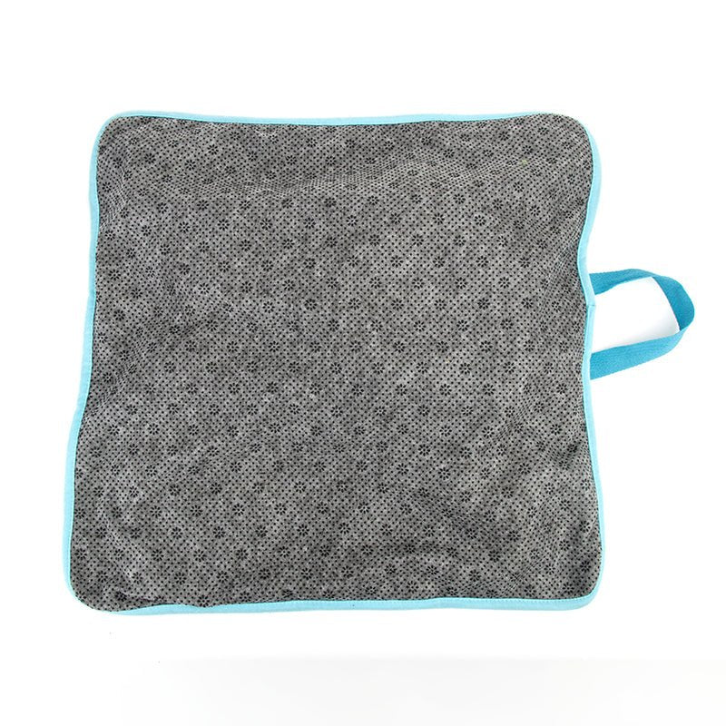 Gray speckled fabric pet snuffle mat square with blue edging and loop handle