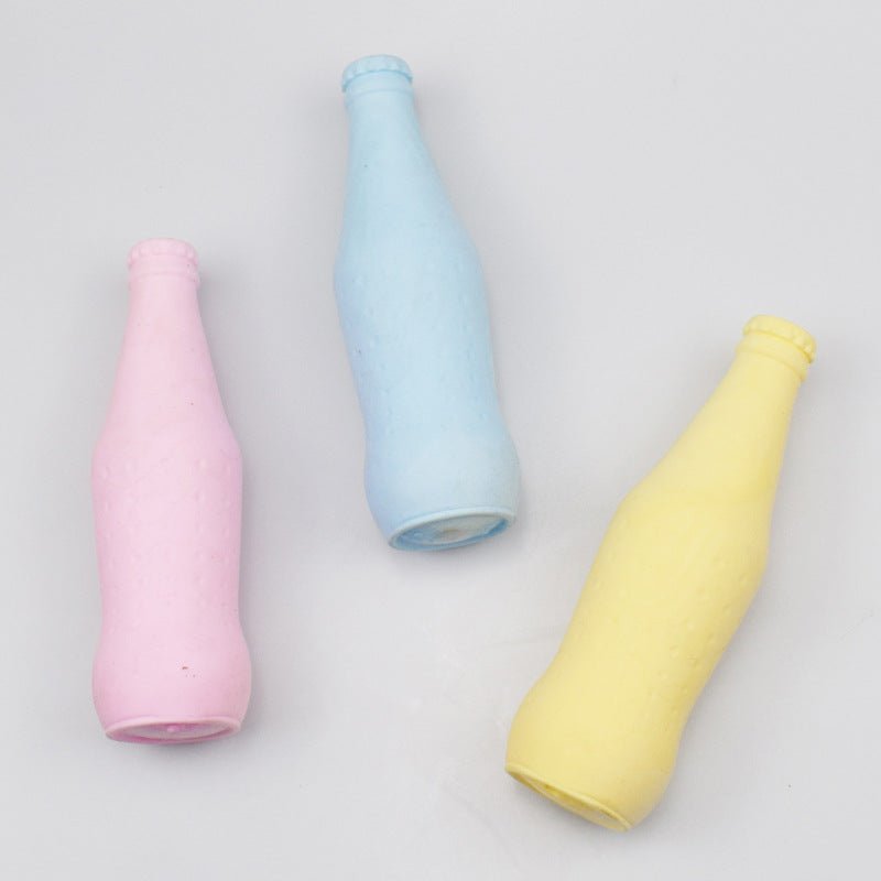 Pet teeth-cleaning toy set of pink, blue, and yellow bottle-shaped chew items