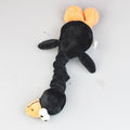 Black bite-resistant dog plush toy with orange ears and a long body