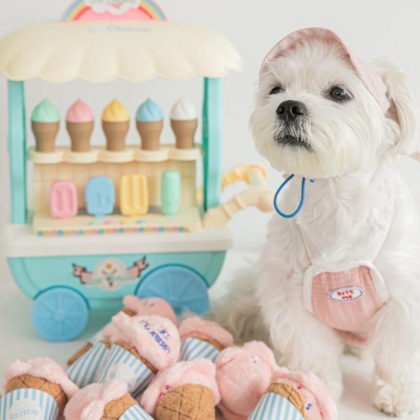 Pet ice cream plush toy with pink fabric top and a brown waffle cone