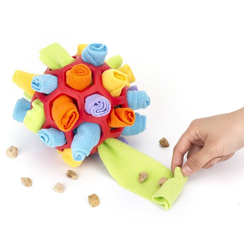 Dog sniffing plush ball toy with multicolor woven spheres and green chew sleeve