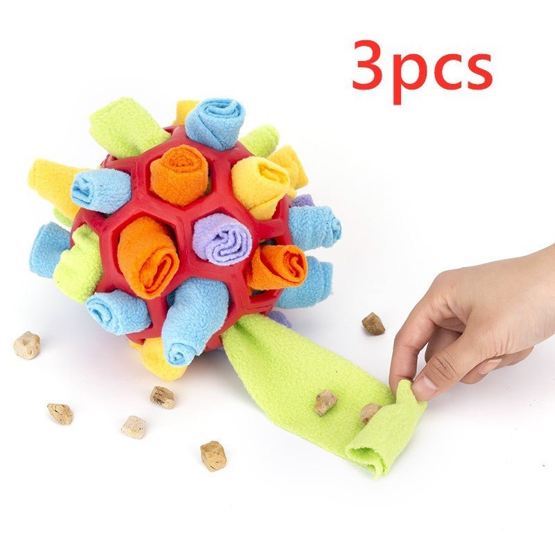 Dog sniffing plush ball toy with multicolor woven spheres and green chew sleeve