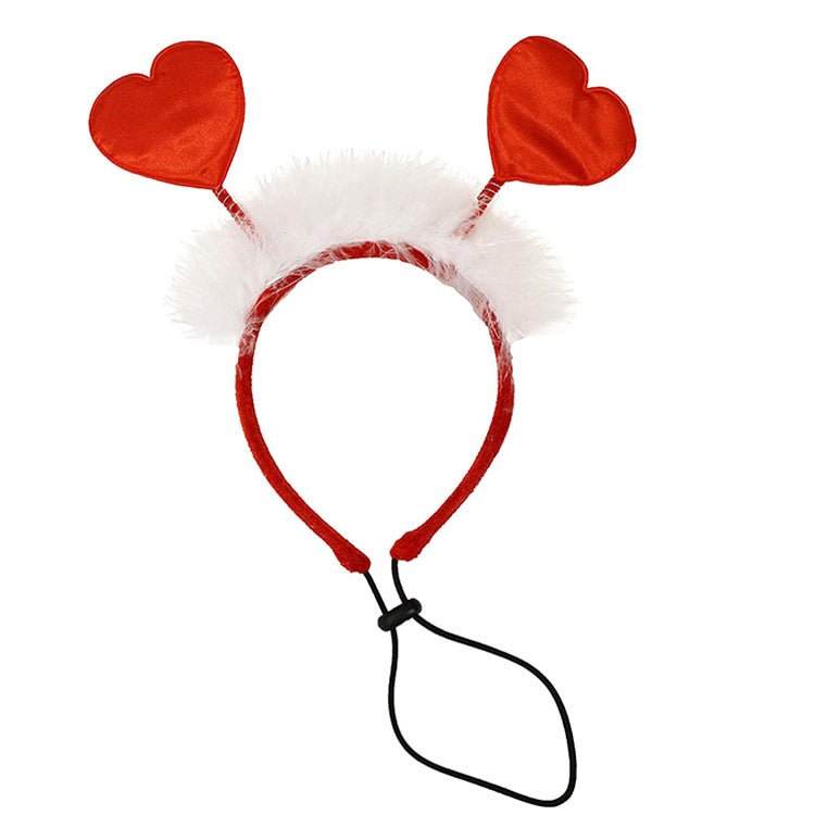 Red heart pet headband with white fluffy ear covers and black loop strap